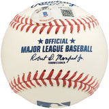 A close-up of a Sports Integrity Walker Buehler Boston Red Sox Signed Official MLB Baseball featuring red stitching, "Official Major League Baseball" text, the commissioner's signature, and a Beckett authentication sticker.