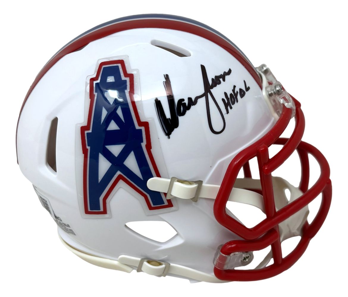 The Sports Integrity Warren Moon Signed Houston Oilers Mini Speed Helmet features a white shell, blue/red oil derrick logo, red face mask, and is inscribed “HOF 06” with Moon’s autograph. Authenticated by BAS.