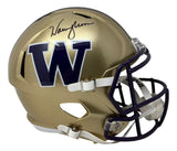 The Sports Integrity Warren Moon Signed Washington Huskies Full Size Speed Replica Helmet BAS features a gold shell, large purple W logo, black autograph, purple face mask, and white chin strap.