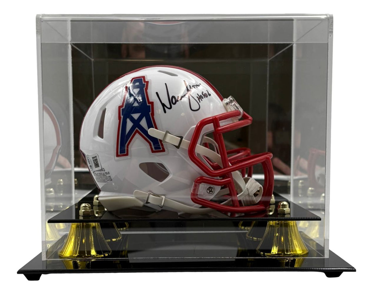 The Sports Integrity Warren Moon Signed Houston Oilers Mini Speed Helmet (HOF 06 Inscribed) comes with a BAS COA and is displayed in a clear acrylic case with black and gold accents.