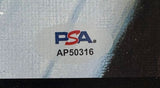 A Sports Integrity Yogi Berra Signed 16x20 Yankees Dvorak 1953 Topps LE/250 Litho features a PSA/DNA sticker with the blue and red PSA logo and serial number AP50316 on a gray and black background.